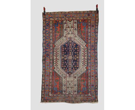 Mazlaghan rug, north west Persia, circa 1920s-30s, 6ft. 6in. X 3ft. 11in. 1.98m. X 1.20m. Overall wear, heavy in places; slig