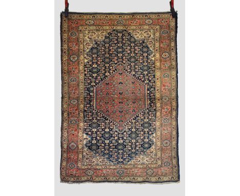 North west Persian rug, Ardabil or Tabriz district, circa 1950s,  5ft. 2in. X 3ft. 7in. 1.58m. X 1.09m. Slight loss to lower 