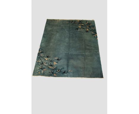 Chinese carpet, probably Beijing, north China, circa 1950s, 9ft. 9in. X 7ft. 10in.  2.97m. X 2.39m. plain pale blue with past