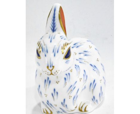 A Royal Crown Derby porcelain Snowy Rabbit paperweight,  21st Anniversary  printed mark to underside and gold button, 10cm hi