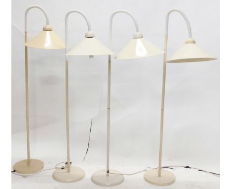Two pairs of cream and white adjustable floor lamps, each with enamel paint.  (AF) 