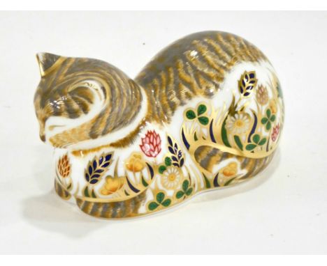 A Royal Crown Derby porcelain Cottage Garden Cat paperweight, red printed mark and gold button to underside, 11cm wide. (boxe