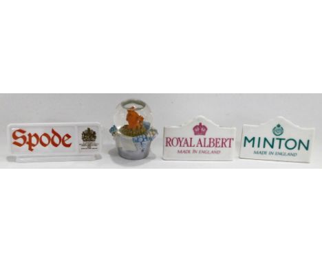 Various porcelain name tags, comprising Royal Albert, 10cm wide, Spode and Minton, and a Classic Pooh Snowstorm figure.  (4)