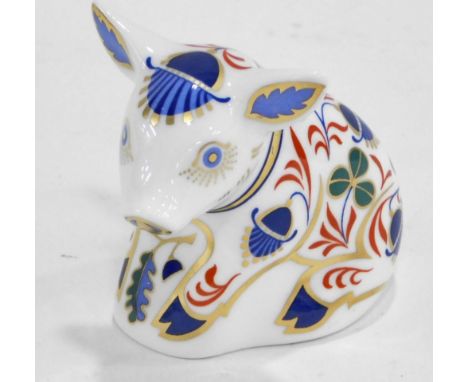 A Royal Crown Derby porcelain Sitting Piglet paperweight, printed mark in red and gold button, 7cm high. (boxed)