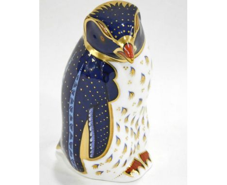 A Royal Crown Derby porcelain Rock Hopper Penguin paperweight,  printed mark in red to underside and gold button, 10cm high. 