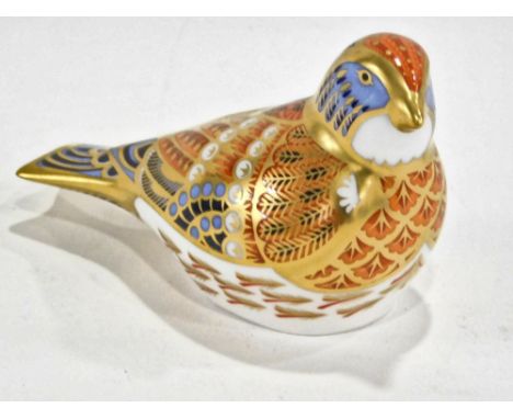 A Royal Crown Derby porcelain Linnet paperweight, printed marks in red and gold button, 8cm wide.  (boxed) 