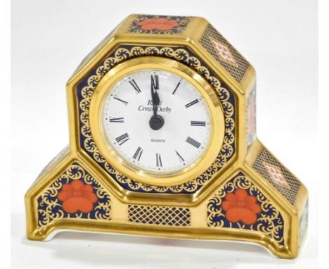A Royal Crown Derby Old Imari pattern quartz mantel clock, in shaped case, printed marks beneath 12cm high, (boxed with paper