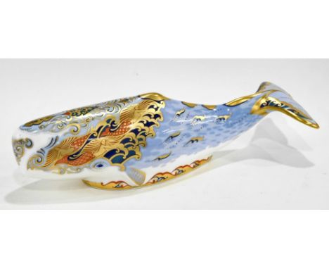 A Royal Crown Derby porcelain Oceanic Whale paperweight, Collectors Guild Issue, printed mark in red to underside with gold b