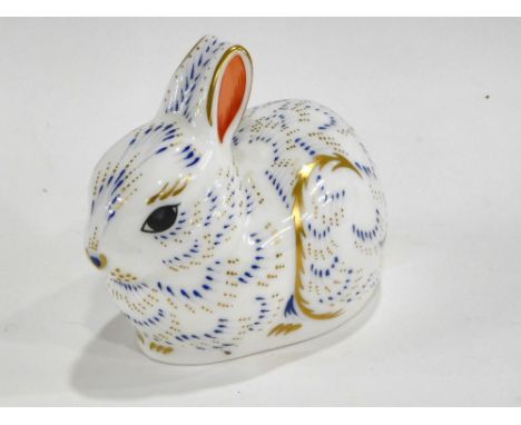 A Royal Crown Derby porcelain Bunny paperweight, printed mark in red to underside and gold button, 7cm high.  (boxed)