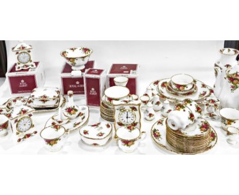 A Royal Albert Old Country Roses part dinner service, to include oval meat plate, 32cm wide, lidded coffee pot, lidded jars, 