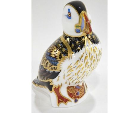 A Royal Crown Derby porcelain Puffin paperweight, printed mark in red and gold button, 12cm high.  (boxed)