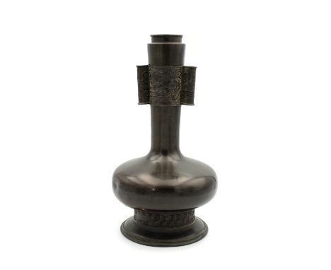 A Chinese bronze arrow vase likely Yuan dynasty (1271-1368), the body of plain globular form, the foot cast with a band of ke