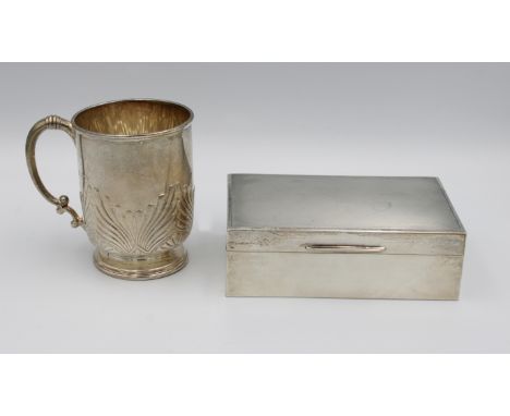 A silver engine turned cigarette boxwooden lining, Birmingham, maker's mark rubbed, 13.7 x 8.8cm. x 4.7cm. high, together wit
