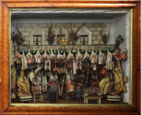 A Victorian butcher's shop display model by Fernley of LimehouseDepicting a butcher's shopfront with the workers holding the 