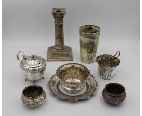 A collection of silver - To include a mounted horn beaker with applied shield shaped presentation'H.T.L.C Singles G.V.W', 11.