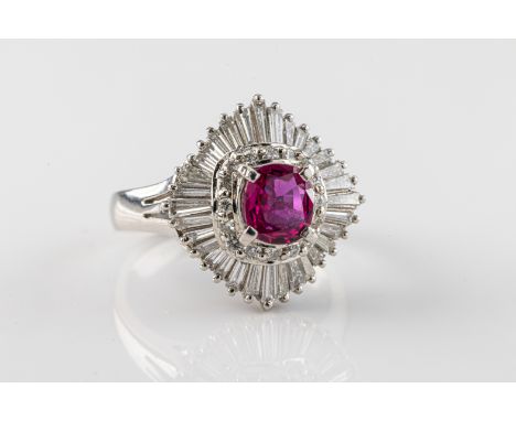 A platinum ruby and diamond dress ringthe round cut ruby approximately 0.76ct, surrounded by round brilliant cut and tapered 