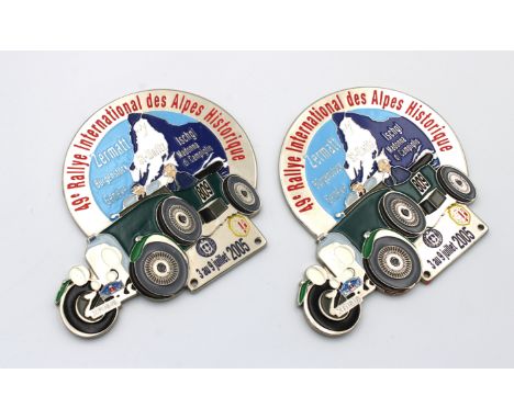 Two chrome and enamel car badges "49e Rally International des Alpes Historique3 au 9 juillet 2005", 11.5 x 10cm. (2)