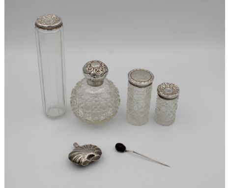 Four silver topped cut glass dressing table bottlesengraved initials on lid, two Birmingham, one Chester, 6cm, 8cm. 10cm. &am