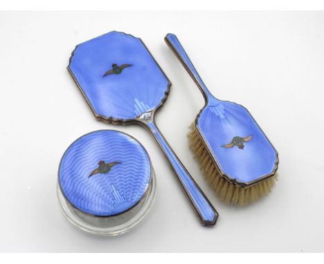 An RAF silver and engine turned blue enamel dressing table setAdie Brothers Ltd, Birmingham, 1914, comprising a mirror, brush