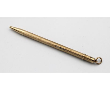 A 9ct Gold Propelling Pencil with Engine Turned CaseCohen &amp; Charles, Birmingham, 1956, 8«cm. long.
