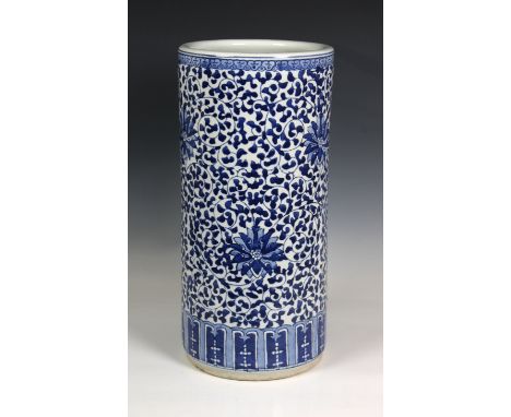 A Chinese blue and white stick standthe heavily potted body decorated with foliate design and flowering chrysanthemums, 44.5c