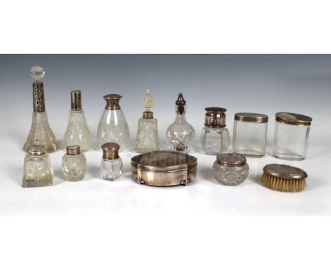A collection of various silver mounted dressing table jars etcfor restoration. (14)