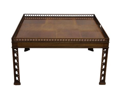 A ?Chinese Chippendale? mahogany occasional tablethe square top with pierced gallery on pierced legs.