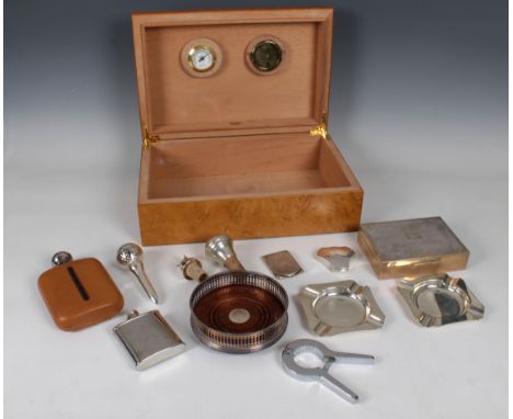 A collection of gentleman's silver and silver plate collectables, housed in a Screwpull cigar humidorto include a silver ciga