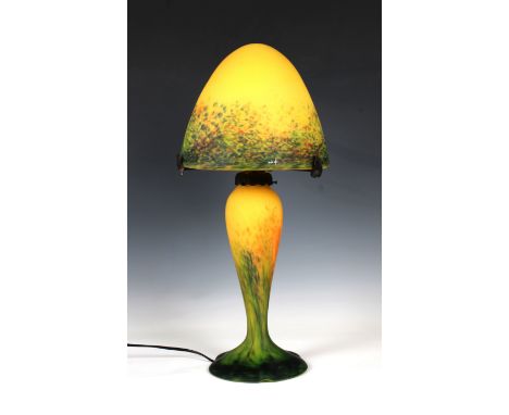 A Le Verre Francais yellow glass lamp and shadethe domed shade with polychrome inclusions on corresponding swollen column and