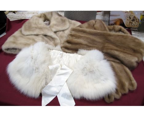 A Light Beige Mink Stole, retailers label for Joseph Fox of Sheffield; a slightly darker beige mink stole and a white fur tip