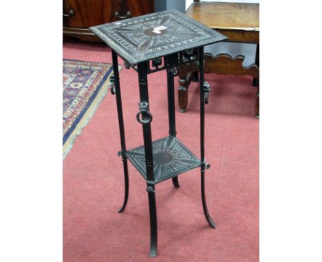 An Early XX Century Bronzed Metal Rectangular Table, cast with Art Deco style stylised motifs, the reeded legs with ring hand