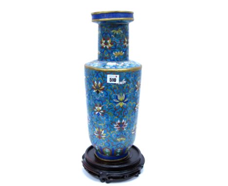 A Late XIX Century Chinese Champléve Enamel Vase, of slightly tapered cylindrical form decorated with stylized colourful flow