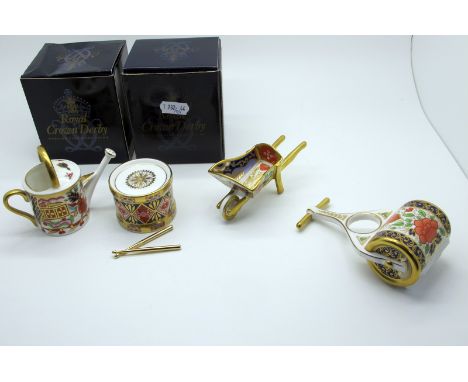 A Royal Crown Derby Miniature Imari Pattern Watering Can, date code for 1996, 7.5cm high, A Miniature Lawn Roller and a March