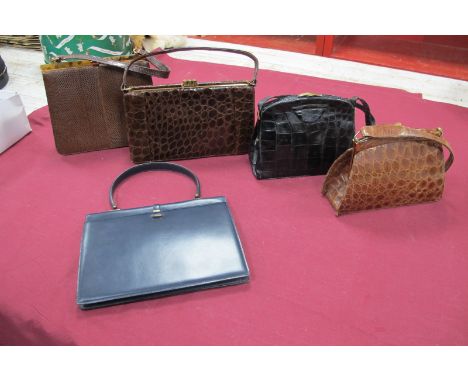 A Vintage Classic Style Riviera Crocodile Skin Handbag, two further vintage crocodile handbags, a python print leather handba