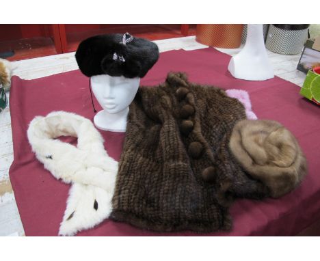 An Ermine Scarf, Edna Wallace light brown mink hat, dark brown mink beret style hat with plait and pom-pom detail and a fur a