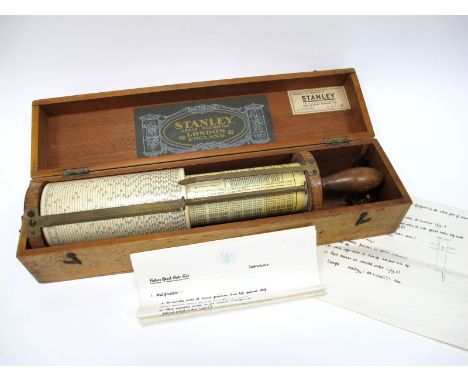 A Stanley, London 'Fullers' Spiral Slide Rule Calculator, with two brass readout markers, sliding cylinders and scale, in ori
