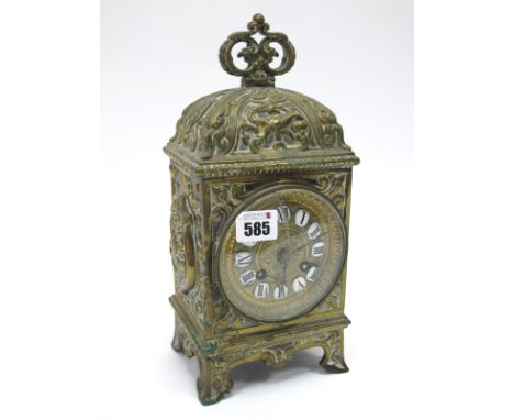 A Late XIX Century Bracket Clock, the rectangular brass clock elaborately embossed with dragons, scrolls and heraldic shield,