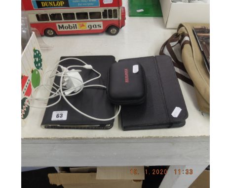 A digital camera, Amazon Kindle &amp; iPad