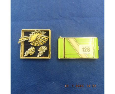 An art deco brooch and matching earrings set with marcasite and art deco enamel compact