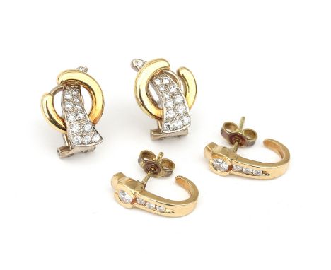 Two pair of 14 karat gold diamond earrings. A pair of two tone circle shaped earrings with brilliant cut diamonds ca. 0.50 ct