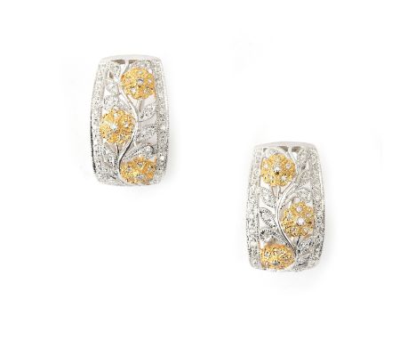 A pair of 18 karat two tone gold diamond earrings. Featuring a flower motif set with brilliant cut diamonds, ca. 1 ct. French