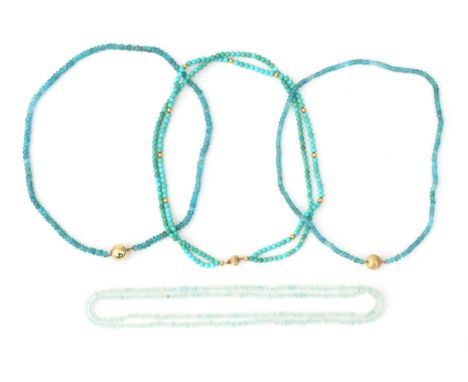 Four gem bead necklaces to a 14 karat gold clasp. Comprising a double strand turquoise necklace with gold spacers and clasp. 