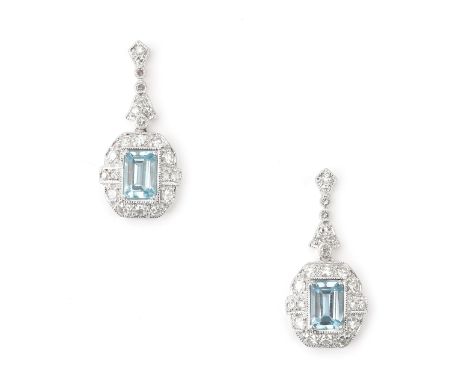 A pair of 14 karat white gold topaz and diamond earrings. Featuring fourty four single cut diamonds of ca. 0.58 ct. and a lig