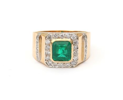 An 18 carat yellow gold emerald and diamond ring. Set with a rectangular faceted cut emerald in the center of ca. 1.40 ct. su