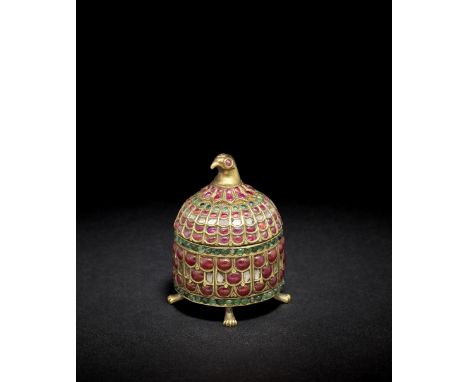 A gem-set gold box India, 19th Centuryof domed cylindrical form on four feet shaped as animal paws, the lid fitted to base wi