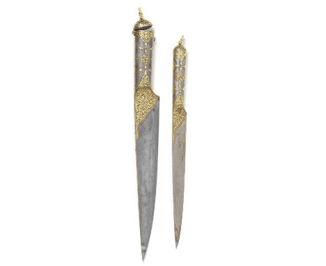 A rare gold-koftgari steel double dagger (kard) North India, 19th Centurycomprising two daggers, the smaller dagger concealed