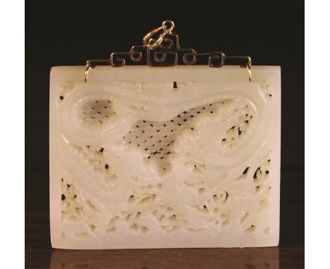 A Chinese Gold Mounted Pale Celadon Jade Pedant Plaque of rectangular form pierced and carved with two sinuous dragons, 2 ins