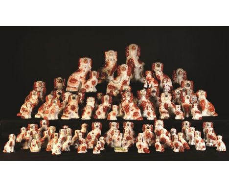 A Large & Impressive Collection of 82 Staffordshire Spaniels with red patch markings, ranging from 12½ ins (32 cms) in height