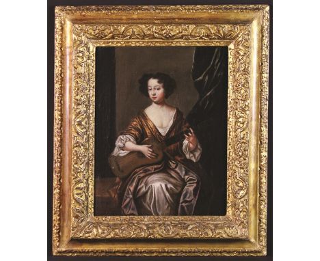 Attributed to Simon Verelst (1644-1710) Oil on Canvas: Portrait of The Duchess of Portsmouth seated in an interior playing a 