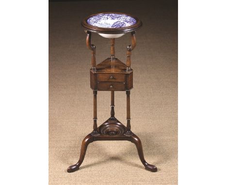 A Fine George III Mahogany Washstand with blue & white bowl. The moulded ring holding a decorative Spode transfer printed bas